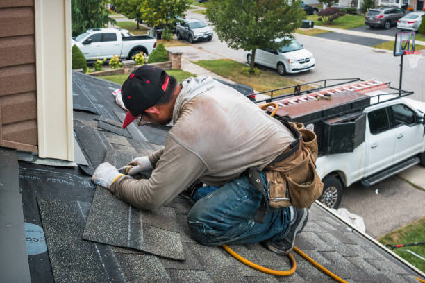 Professional Emergency Roof Repair technician working in East Rockaway, NY